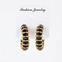 EARRINGS IN GOLD AND BLACK COLOR