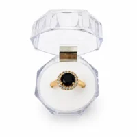 RING IN GOLDEN COLOR WITH BLACK STONE