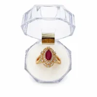 RING IN GOLDEN COLOR WITH MAHROON STONE