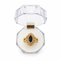 RING IN GOLDEN COLOR WITH BLACK STONE