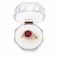 RING IN GOLD COLOR WITH RED STONE